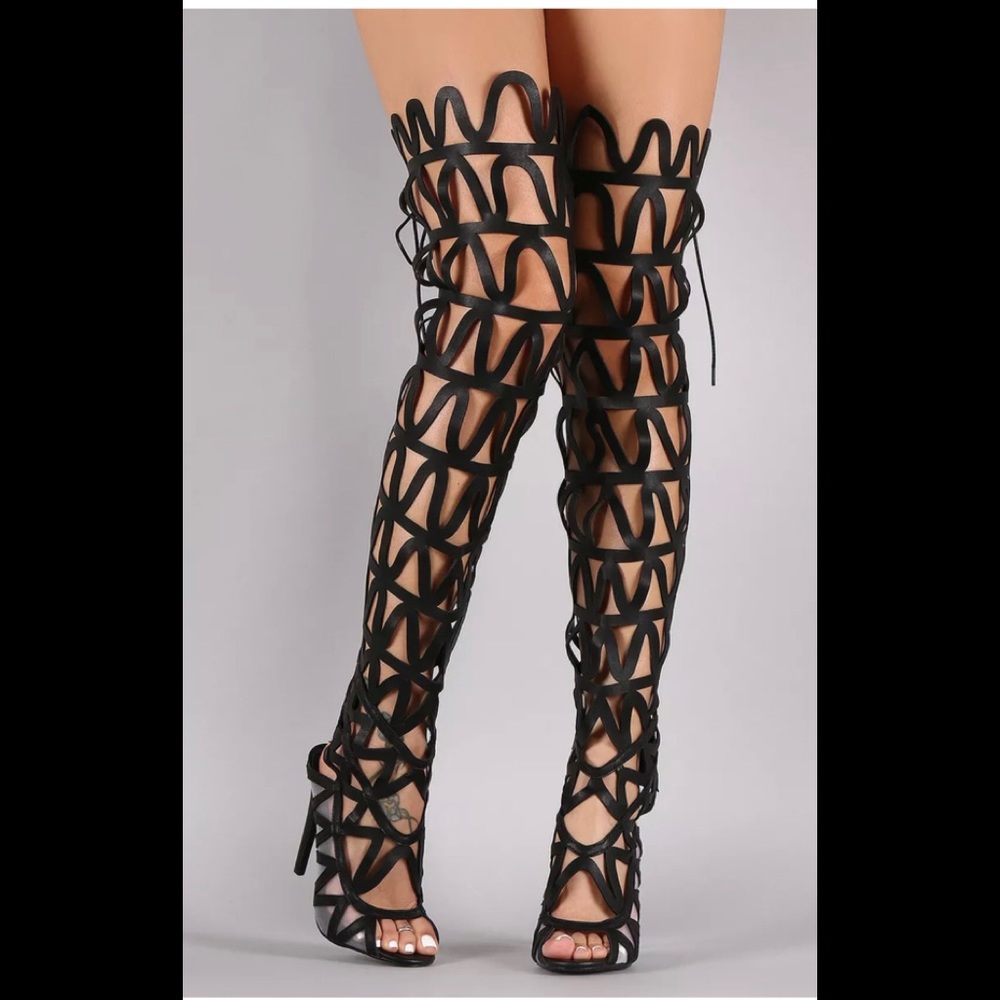 Black thigh high stilettos heels
